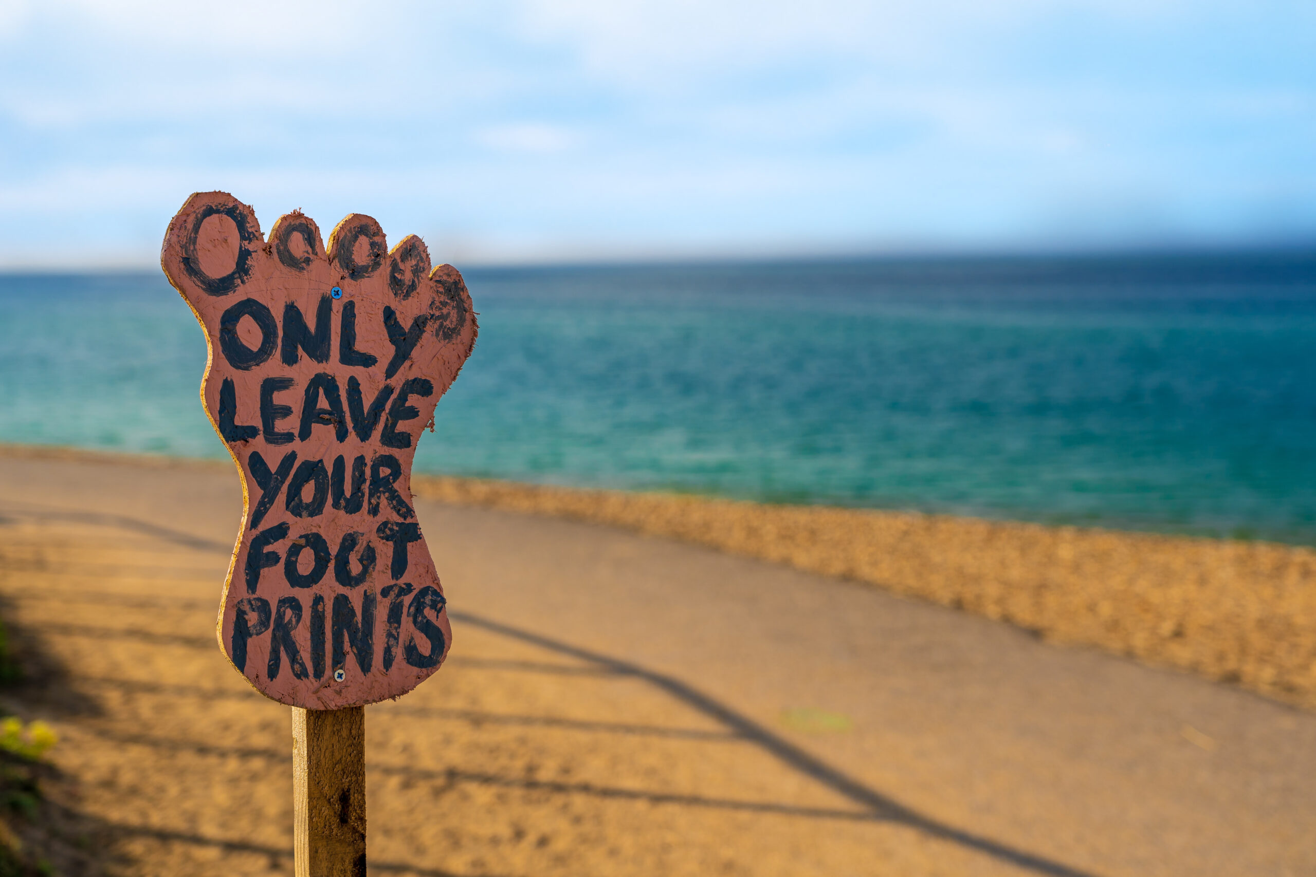 Foot Sign on the beach - only leave your footprints
